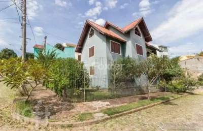 Casa com 4 quartos à venda na rua inês vinhas, 40, espírito santo, porto alegre, 220 m2 por r$ 990.000