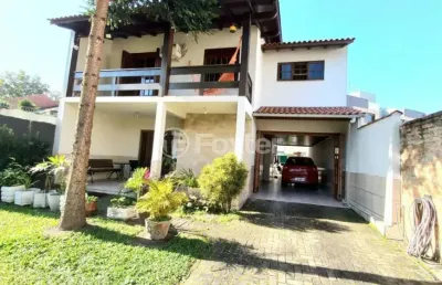 Casa com 5 quartos à venda na avenida coronel marcos, 2124, pedra redonda, porto alegre, 150 m2 por r$ 1.300.000
