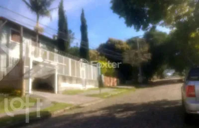 Casa com 3 quartos à venda na rua dos caiaguais, 207, espírito santo, porto alegre, 220 m2 por r$ 550.000