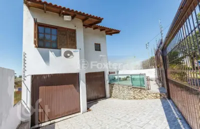 Casa com 4 quartos à venda na avenida edu las-casas, 565, parque santa fé, porto alegre, 237 m2 por r$ 649.000
