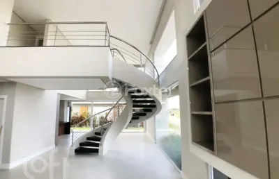 Casa em condomínio fechado com 4 quartos à venda na avenida paraguassu, zona nova, capão da canoa, 300 m2 por r$ 2.080.000