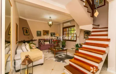 Casa com 3 quartos à venda na rua olécio cavedini, 255, espírito santo, porto alegre, 159 m2 por r$ 954.000