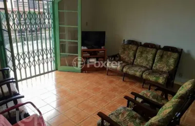 Casa com 2 quartos à venda na rua padre joão batista reus, 3081, camaquã, porto alegre, 146 m2 por r$ 600.000