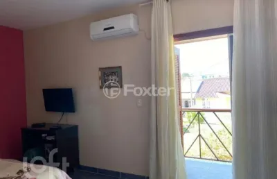 Casa em condomínio fechado com 3 quartos à venda na avenida edgar pires de castro, 2145, hípica, porto alegre, 128 m2 por r$ 530.000