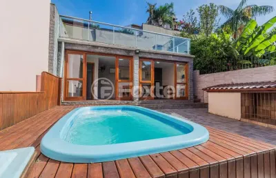 Casa em condomínio fechado com 3 quartos à venda na rua erechim, 100, nonoai, porto alegre, 220 m2 por r$ 700.000