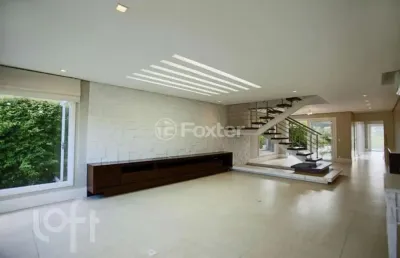 Casa em condomínio fechado com 3 quartos à venda na avenida juca batista, 9000, belém novo, porto alegre, 297 m2 por r$ 2.200.000