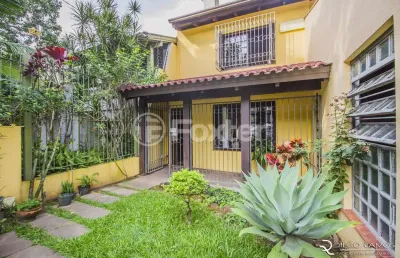 Casa com 3 quartos à venda na rua carlos huber, 215, três figueiras, porto alegre, 249 m2 por r$ 950.000
