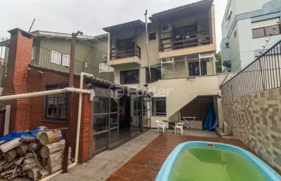Casa com 4 quartos à venda na rua joaquim cruz, 30, santo antônio, porto alegre, 256 m2 por r$ 1.149.000