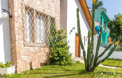 Casa com 6 quartos à venda na rua paissandu, 298, partenon, porto alegre, 300 m2 por r$ 1.300.000