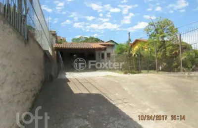Casa com 3 quartos à venda na avenida vicente monteggia, 2406, cavalhada, porto alegre, 156 m2 por r$ 600.000