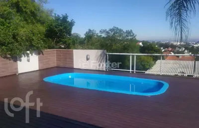Casa com 3 quartos à venda na rua altos da amapá, 120, vila nova, porto alegre, 300 m2 por r$ 1.090.000