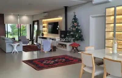 Casa em condomínio fechado com 3 quartos à venda na avenida juca batista, 8000, chapéu do sol, porto alegre, 370 m2 por r$ 3.135.000