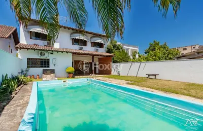 Casa com 3 quartos à venda na rua pedro de oliveira bittencourt, 103, tristeza, porto alegre, 324 m2 por r$ 1.800.000