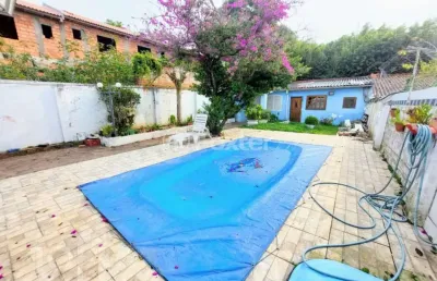 Casa com 3 quartos à venda na rua sebastião wolf, 181, nonoai, porto alegre, 180 m2 por r$ 870.000