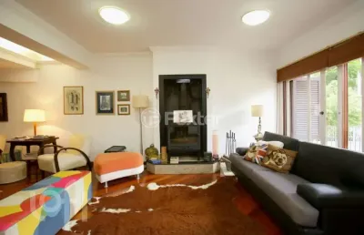 Casa com 4 quartos à venda na rua matias josé bins, 326, três figueiras, porto alegre, 363 m2 por r$ 1.650.000