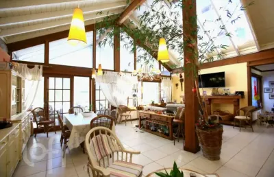 Casa em condomínio fechado com 3 quartos à venda na avenida juca batista, 8000, belém novo, porto alegre, 250 m2 por r$ 1.990.000