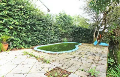 Casa com 3 quartos à venda na rua rafael clark, 113, partenon, porto alegre, 170 m2 por r$ 700.000