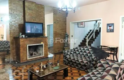 Casa com 3 quartos à venda na rua coronel neves, 472, medianeira, porto alegre, 450 m2 por r$ 1.600.000