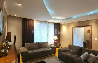 Casa com 5 quartos à venda na rua campos elíseos, 291, glória, porto alegre, 300 m2 por r$ 897.000
