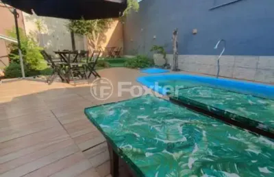 Casa com 4 quartos à venda na rua waldemar guido vicentini, 364, dom feliciano, gravataí, 266 m2 por r$ 1.050.000