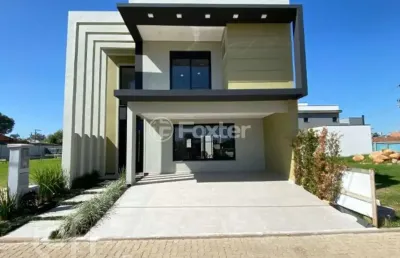 Casa em condomínio fechado com 3 quartos à venda na rua cairu, 444, rio branco, canoas, 177 m2 por r$ 1.090.000