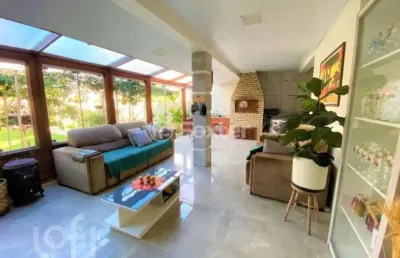 Casa com 4 quartos à venda na rua quinze de novembro, 186, nossa senhora das graças, canoas, 230 m2 por r$ 1.280.000