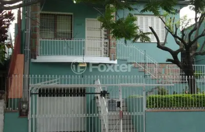 Casa com 3 quartos à venda na rua guilherme schell, 253, santo antônio, porto alegre, 233 m2 por r$ 731.500