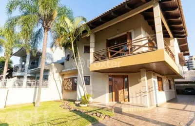Casa com 4 quartos à venda na rua irmão fernando anatoli, 147, marechal rondon, canoas, 300 m2 por r$ 1.910.000