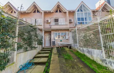 Casa com 2 quartos à venda na rua heitor kramer, 324, guarujá, porto alegre, 120 m2 por r$ 450.000