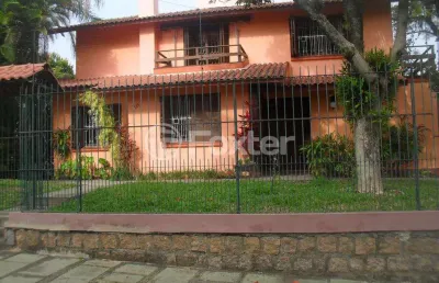 Casa com 5 quartos à venda na rua itapitocaí, 725, cristal, porto alegre, 225 m2 por r$ 1.590.000