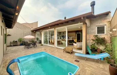 Casa com 3 quartos à venda na rua das petúnias, 737, estância velha, canoas, 166 m2 por r$ 998.000