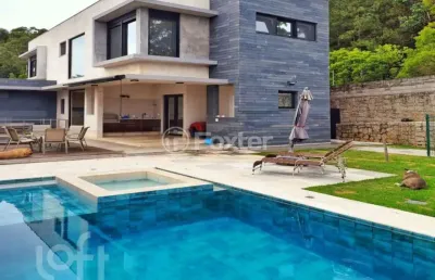 Casa em condomínio fechado com 3 quartos à venda na estrada haroldo soares glavan, 4940, cacupé, florianópolis, 323 m2 por r$ 7.180.000