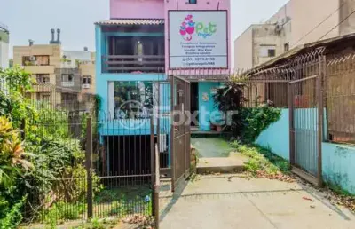 Casa com 4 quartos à venda na rua eudoro berlink, 946, auxiliadora, porto alegre, 190 m2 por r$ 1.200.000