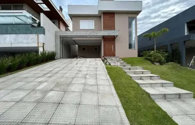 Casa em condomínio fechado com 3 quartos à venda na avenida senador salgado filho, 8500, querência, viamão, 399 m2 por r$ 1.350.000