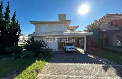 Casa em condomínio fechado com 3 quartos à venda na avenida senador salgado filho, 8500, querência, viamão, 459 m2 por r$ 1.690.000