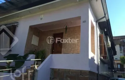 Casa com 5 quartos à venda na rua guilherme schell, 161, santo antônio, porto alegre, 396 m2 por r$ 950.000