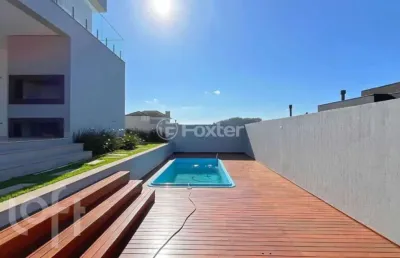 Casa em condomínio fechado com 4 quartos à venda na estrada das três meninas, 2001, vila nova, porto alegre, 293 m2 por r$ 2.390.000