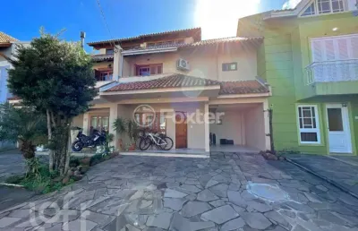 Casa em condomínio fechado com 3 quartos à venda na avenida juca batista, 1458, cavalhada, porto alegre, 153 m2 por r$ 749.000