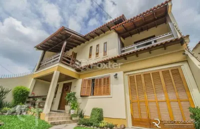 Casa com 5 quartos à venda na avenida josé corrêa da silva, 117, cavalhada, porto alegre, 316 m2 por r$ 720.000