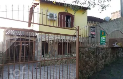 Casa com 3 quartos à venda na avenida teresina, 249, medianeira, porto alegre, 190 m2 por r$ 380.000