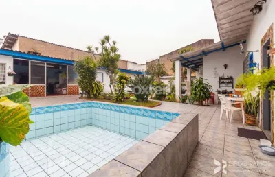 Casa com 3 quartos à venda na rua coronel massot, 1583, cristal, porto alegre, 240 m2 por r$ 795.000