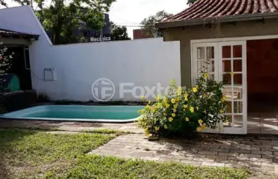 Casa em condomínio fechado com 3 quartos à venda na avenida juca batista, 4115, hípica, porto alegre, 190 m2 por r$ 499.000