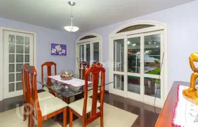 Casa com 4 quartos à venda na rua doutor barcelos, 2628, tristeza, porto alegre, 308 m2 por r$ 1.200.000