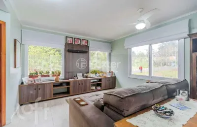 Casa com 3 quartos à venda na rua henrique anawate, 470, guarujá, porto alegre, 137 m2 por r$ 900.000