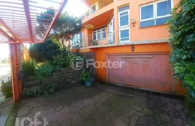 Casa com 4 quartos à venda na rua guabirobeira, 138, jardim do bosque, cachoeirinha, 282 m2 por r$ 1.250.000