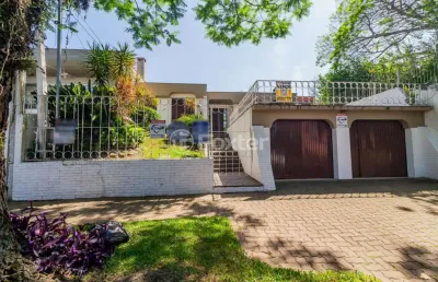 Casa com 4 quartos à venda na avenida pereira passos, 796, vila assunção, porto alegre, 255 m2 por r$ 1.200.000