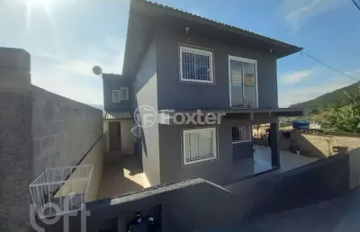 Casa com 4 quartos à venda na servidão amâncio sebastião schudt, 51, fundos, biguaçu, 255 m2 por r$ 620.000