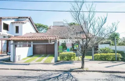 Casa com 4 quartos à venda na rua marquês do maricá, 341, vila nova, porto alegre, 255 m2 por r$ 950.000