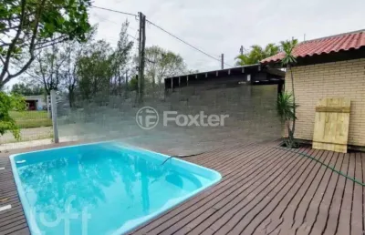 Casa com 5 quartos à venda na rua argentina, 557, zona norte, capão da canoa, 190 m2 por r$ 600.000