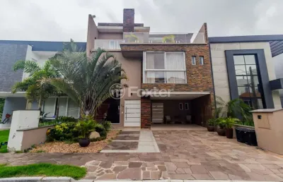 Casa em condomínio fechado com 3 quartos à venda na rua ivo walter kern, 599, hípica, porto alegre, 291 m2 por r$ 1.490.000